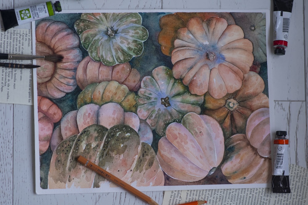 a drawing of a bunch of pumpkins on a piece of paper