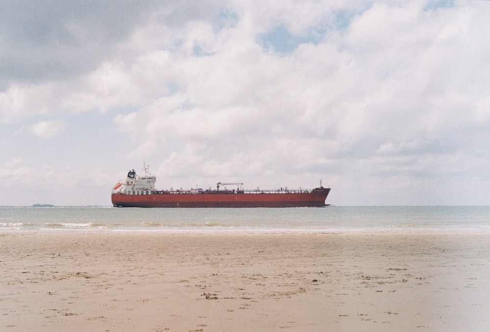 a large cargo ship in the middle of the ocean