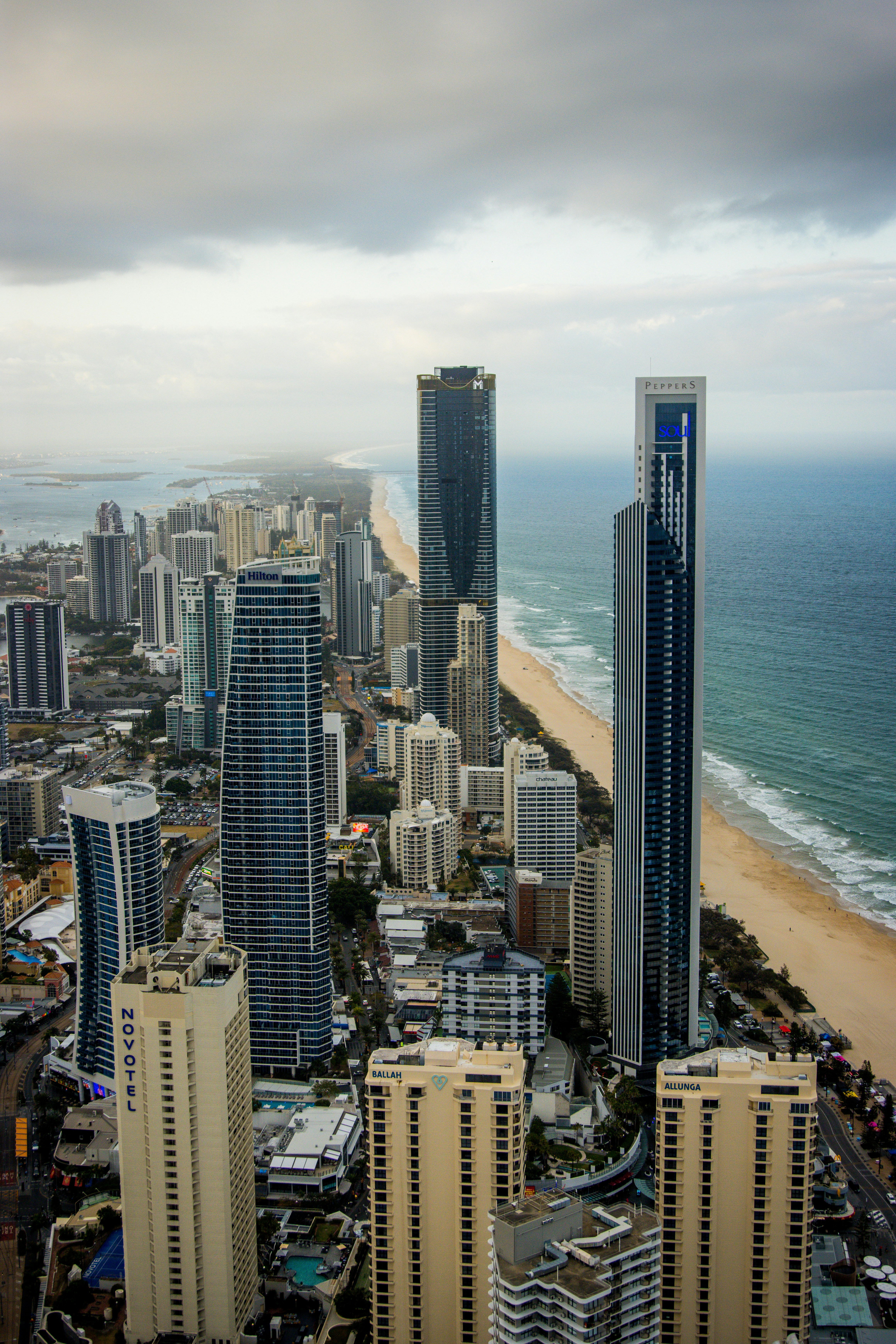 an aerial view of a city with high rise buildings