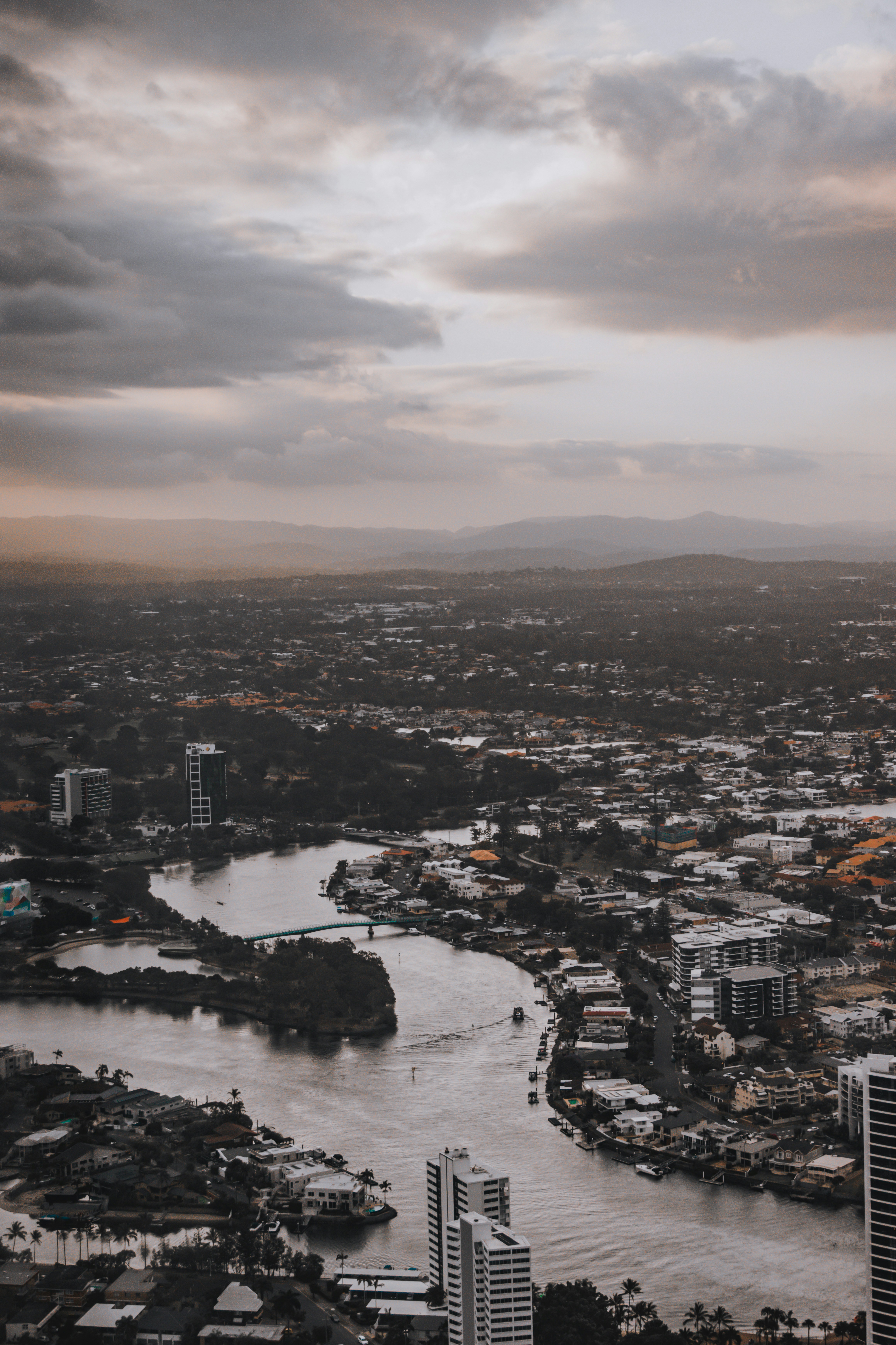 an aerial view of a city with a river running through it