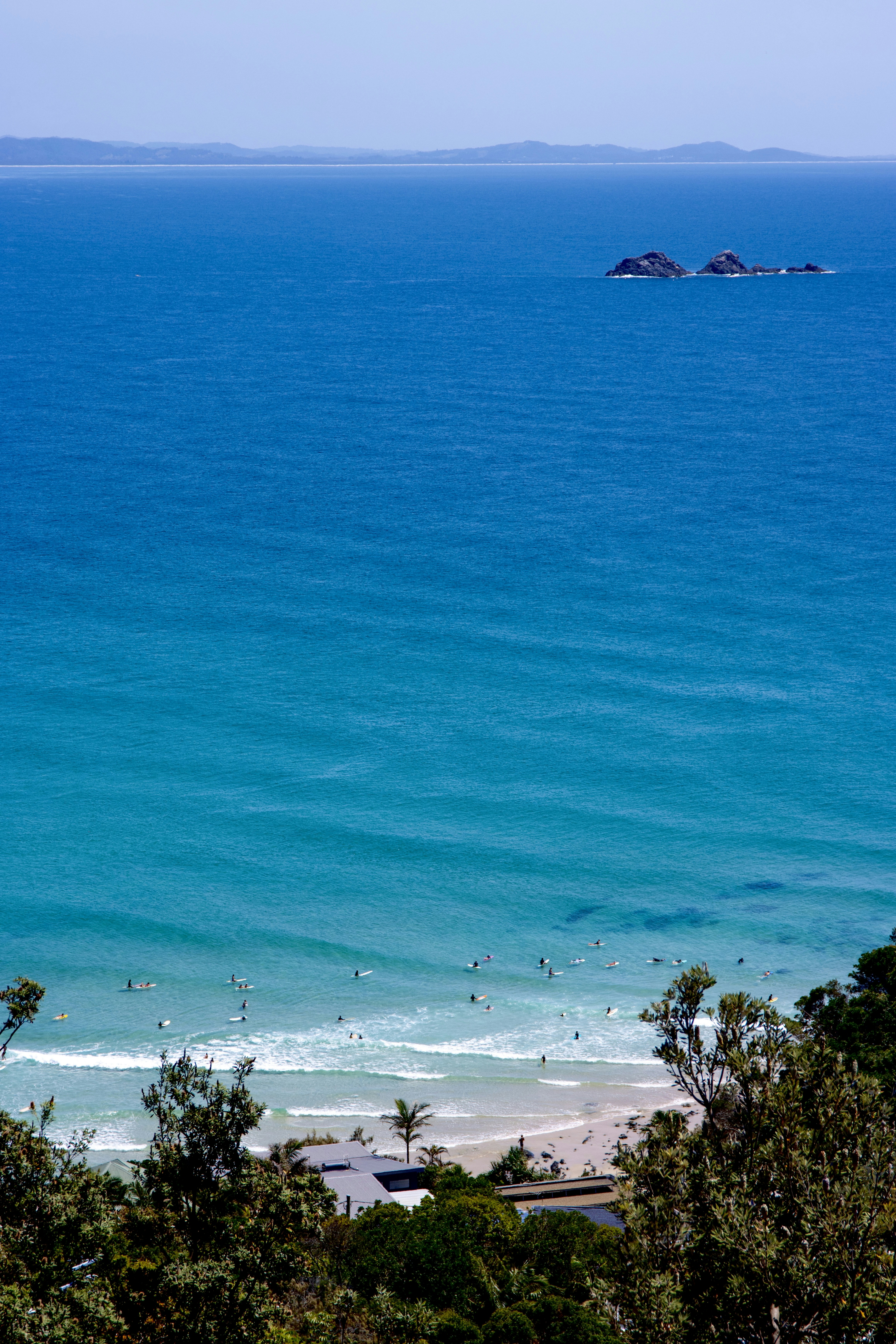 a large body of water surrounded by trees