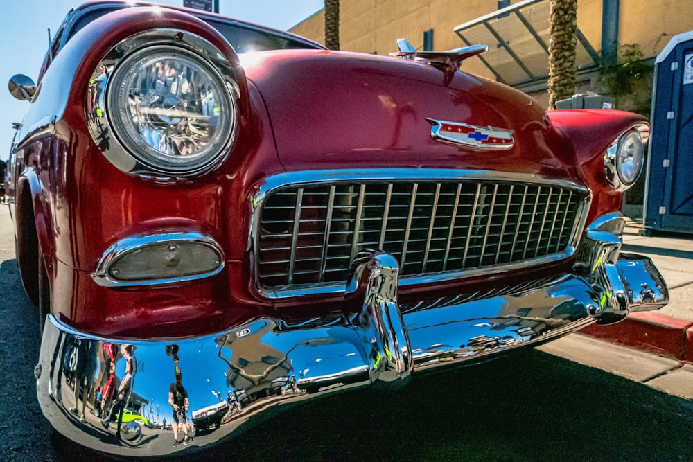 a close up of the front of a classic car