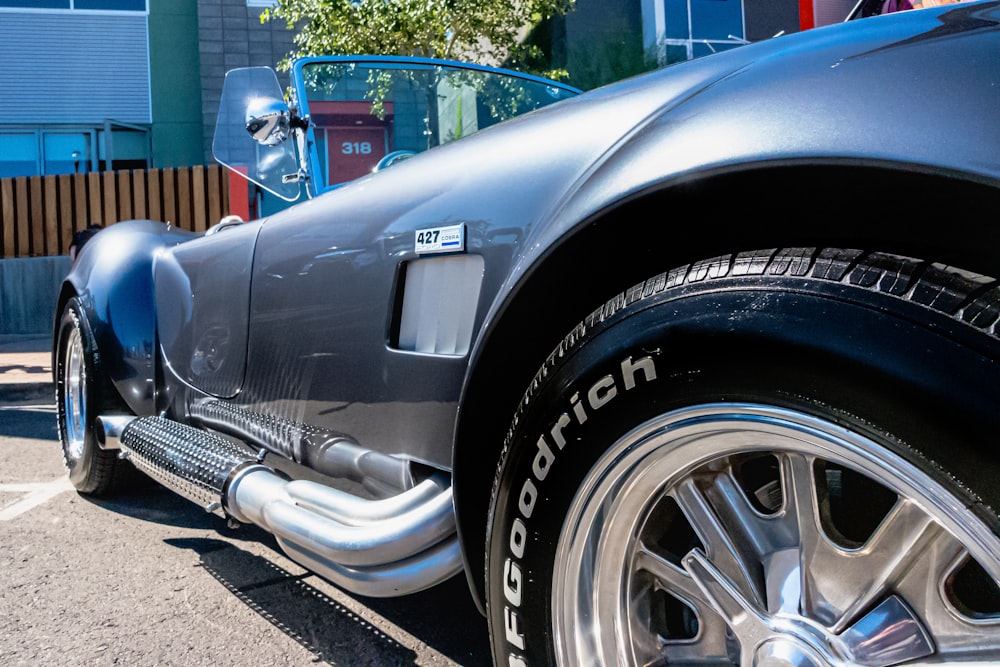 a close up of a car parked in a parking lot