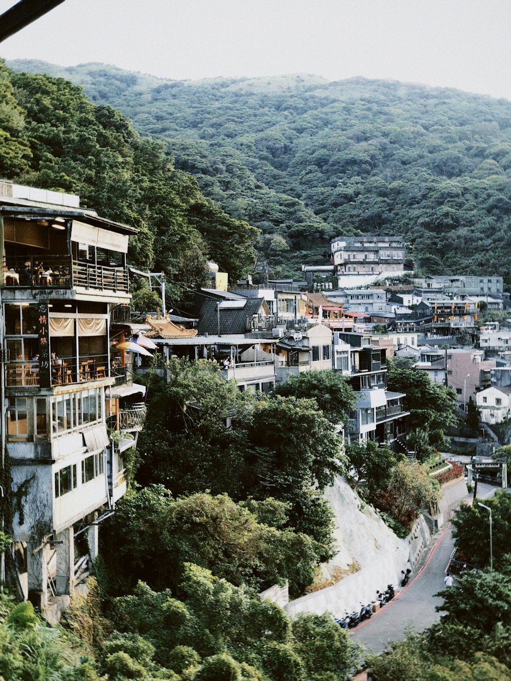 a view of a city with a mountain in the background