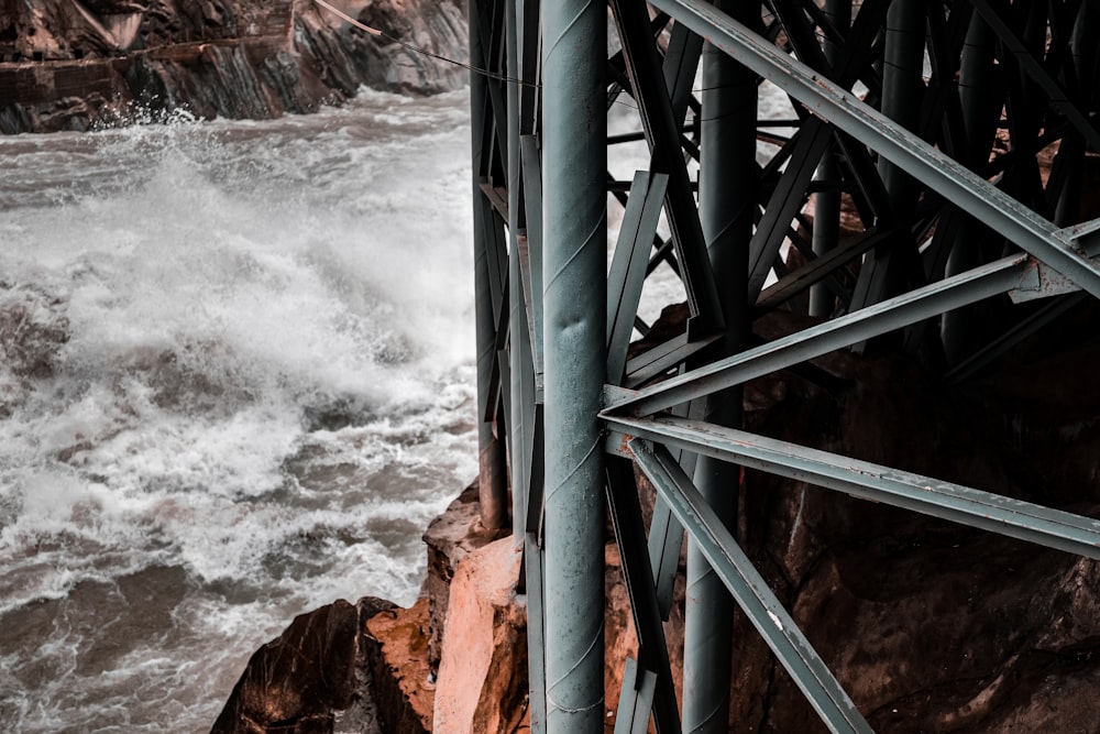 a large body of water under a bridge