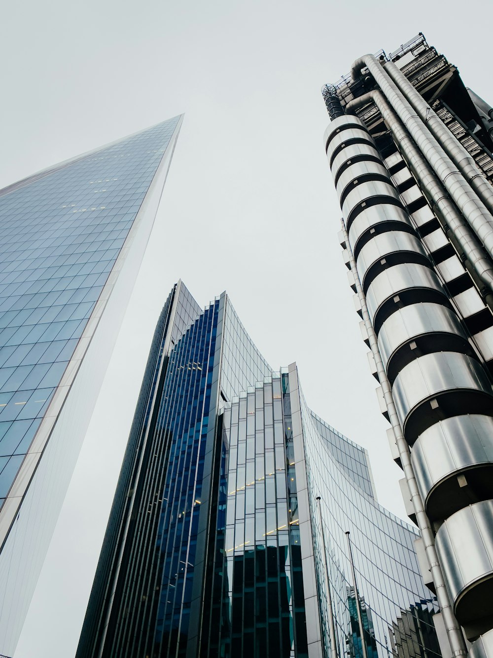 a very tall building next to a very tall building