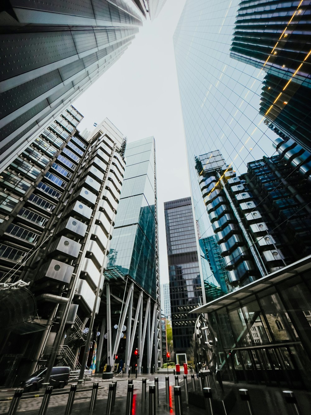 looking up at tall buildings in a city