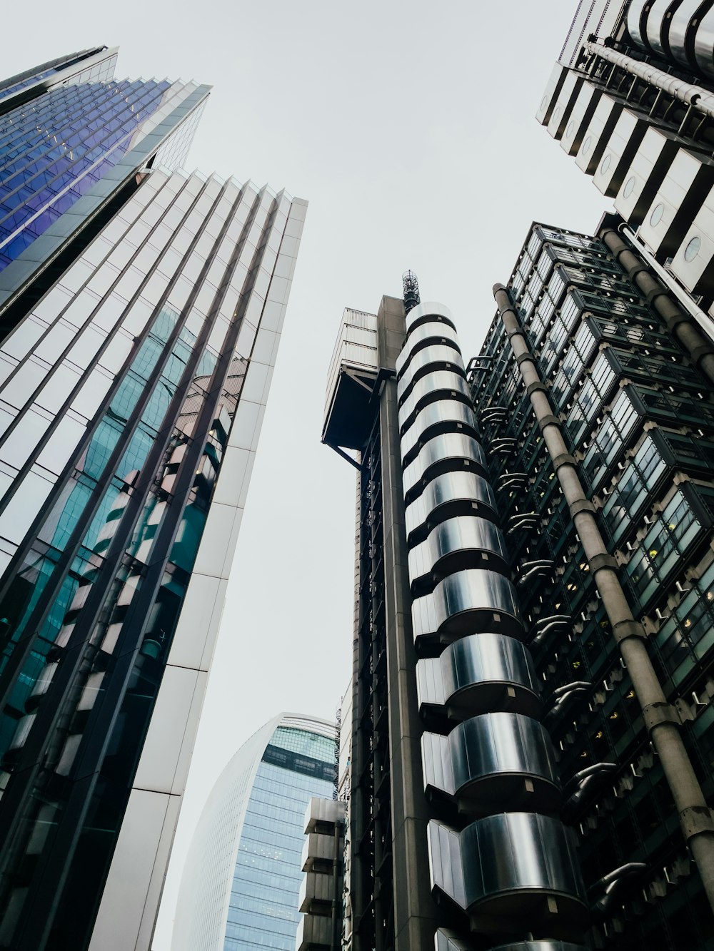 a group of tall buildings next to each other