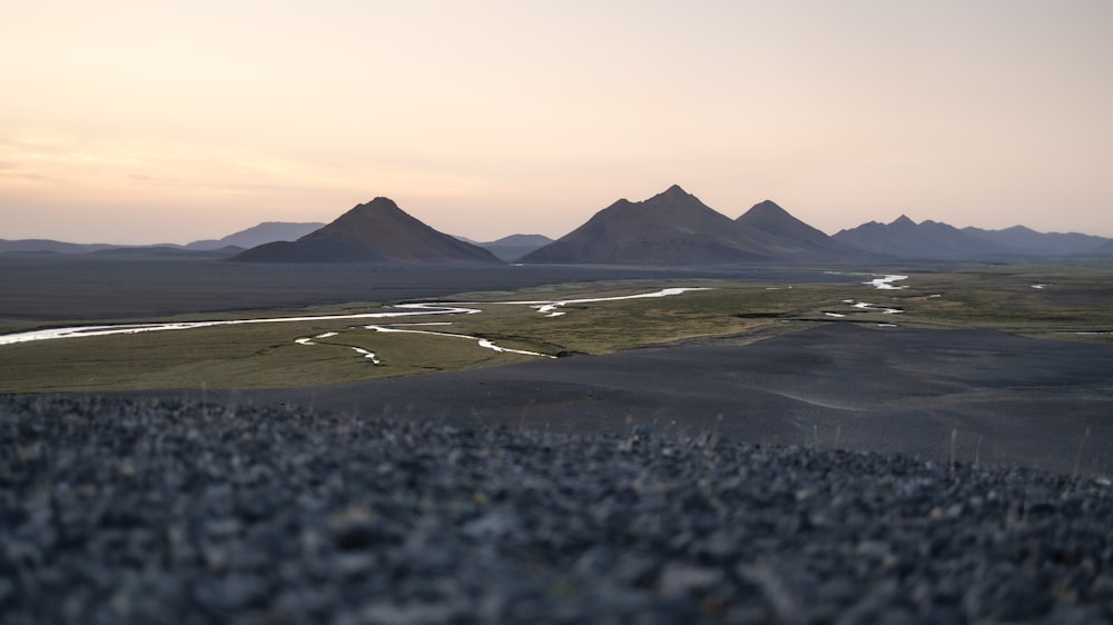 a mountain range with a river running through it