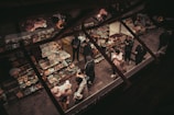 a group of people standing around a market