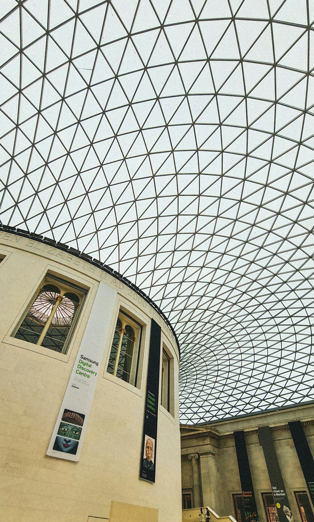 the ceiling of a building with a glass roof