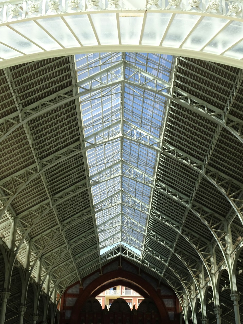 the inside of a train station with a skylight