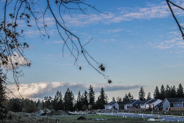 A wide shot of a residential neighborhood with several newly built houses by RMO Construction Inc.