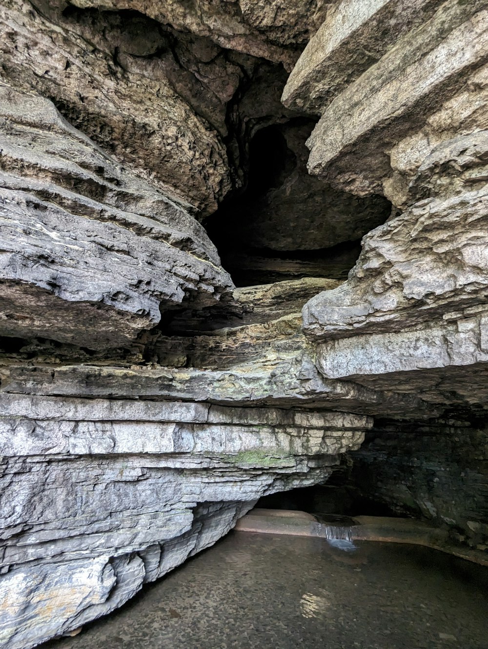 a narrow passage in a rock formation