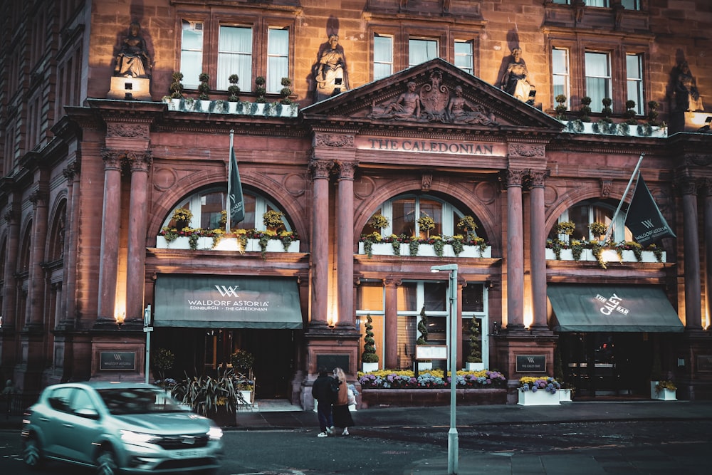 a car is parked in front of a building