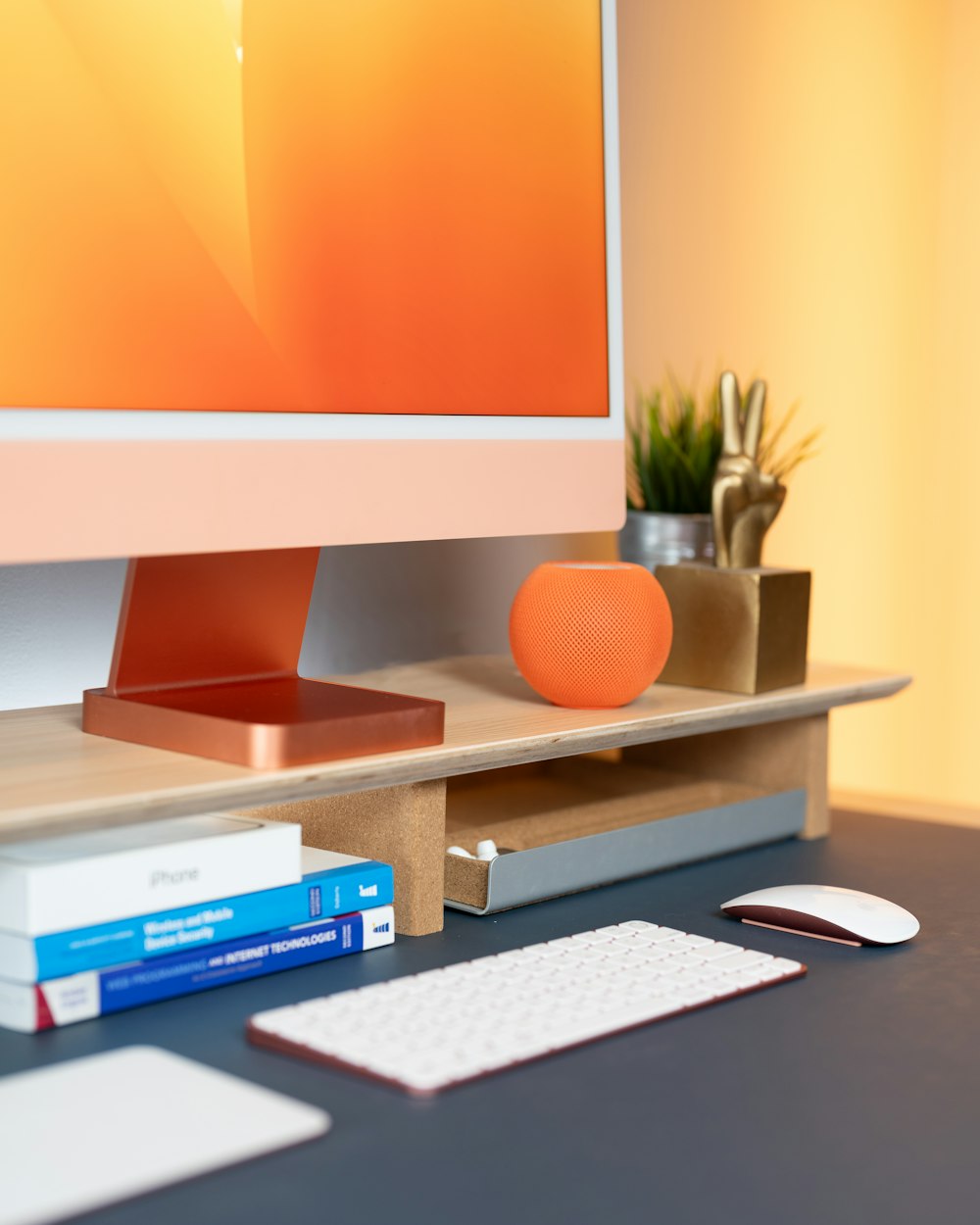 a computer monitor sitting on top of a desk