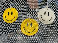 Close-up of a colorful air freshener hanging in a bright kitchen.