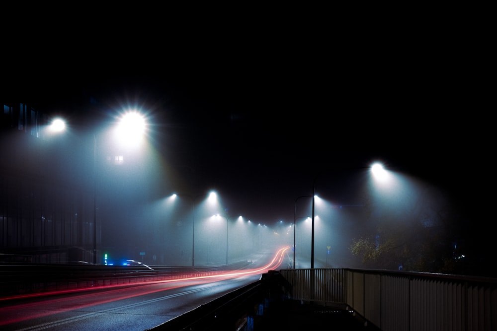 a street at night with street lights on