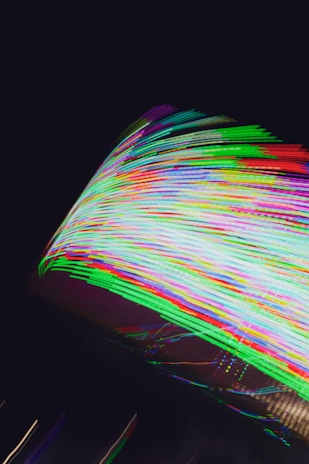 Electric magenta neon cracks spreading across a dark background, evoking a futuristic glitch art vibe.