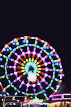 Close-up of a spinning roulette wheel with bright, dynamic colors.