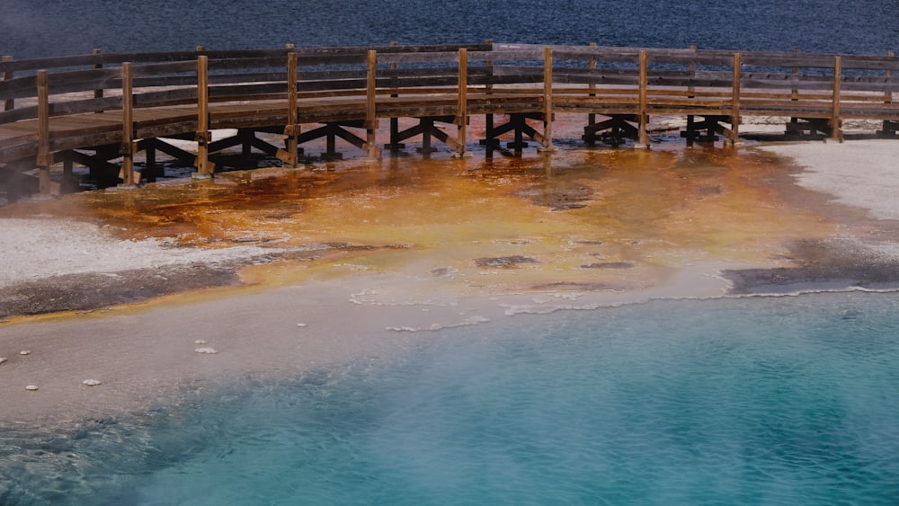 a wooden bridge over a body of water