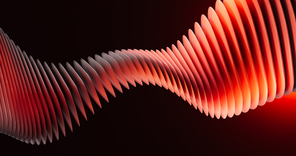 a red and white wave on a black background