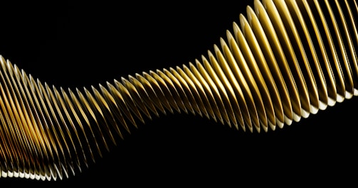 Minimalist album cover art featuring intertwined sound waves and crescent shapes in gold on black.
