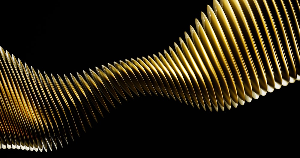 a close up of a wavy object on a black background