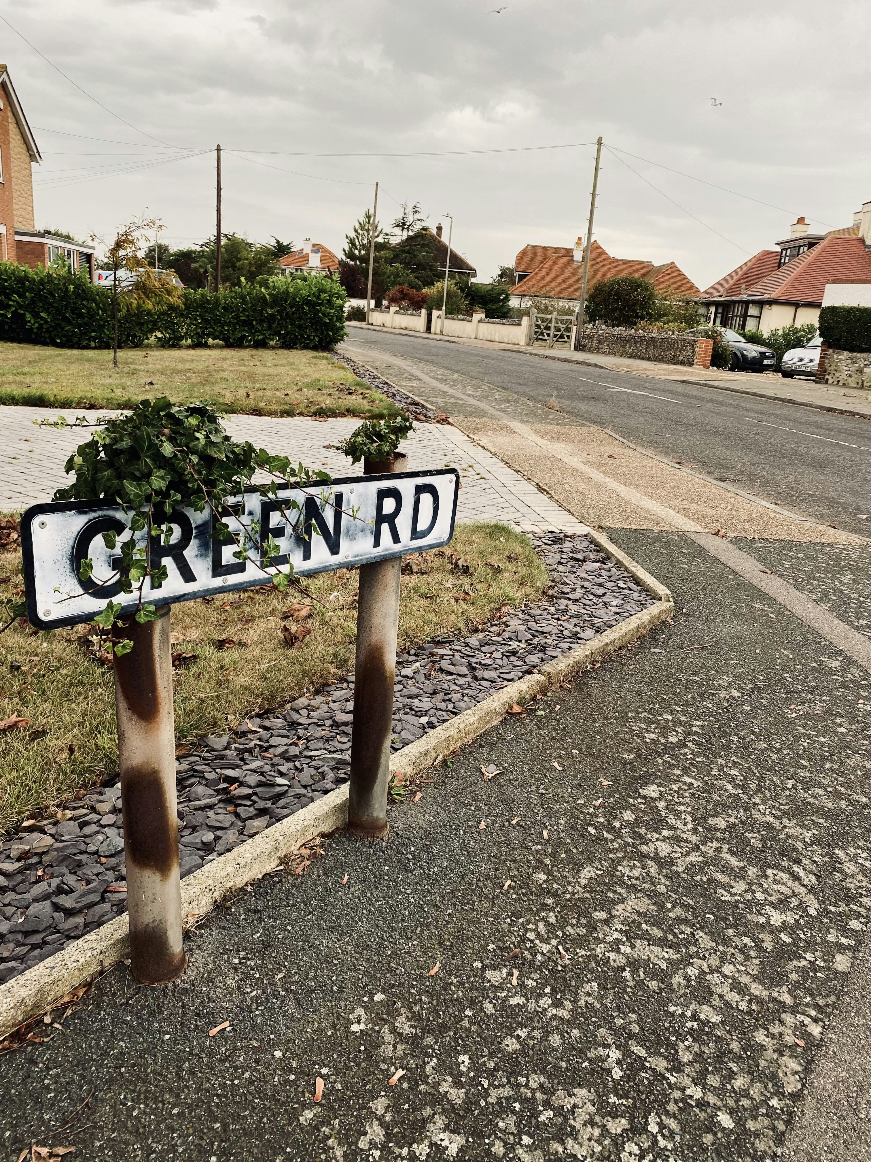 a street sign sitting on the side of a road