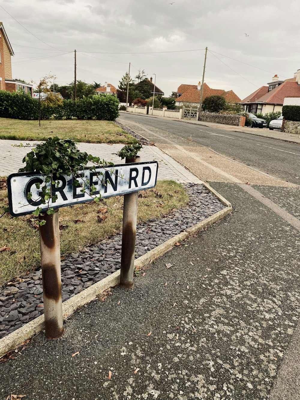 a street sign sitting on the side of a road