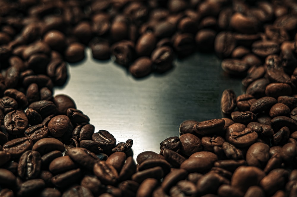 a heart shape made out of coffee beans