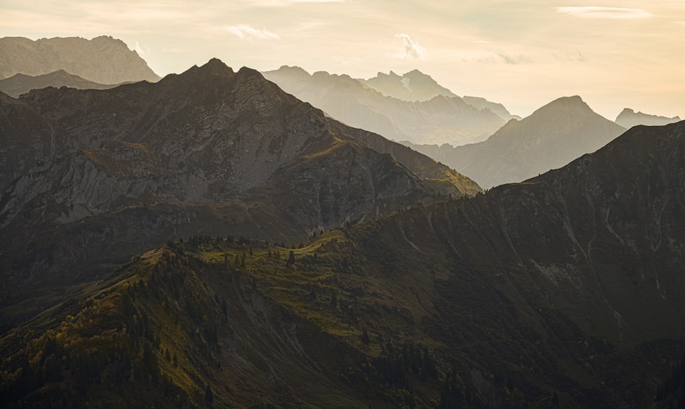 a view of a mountain range at sunset