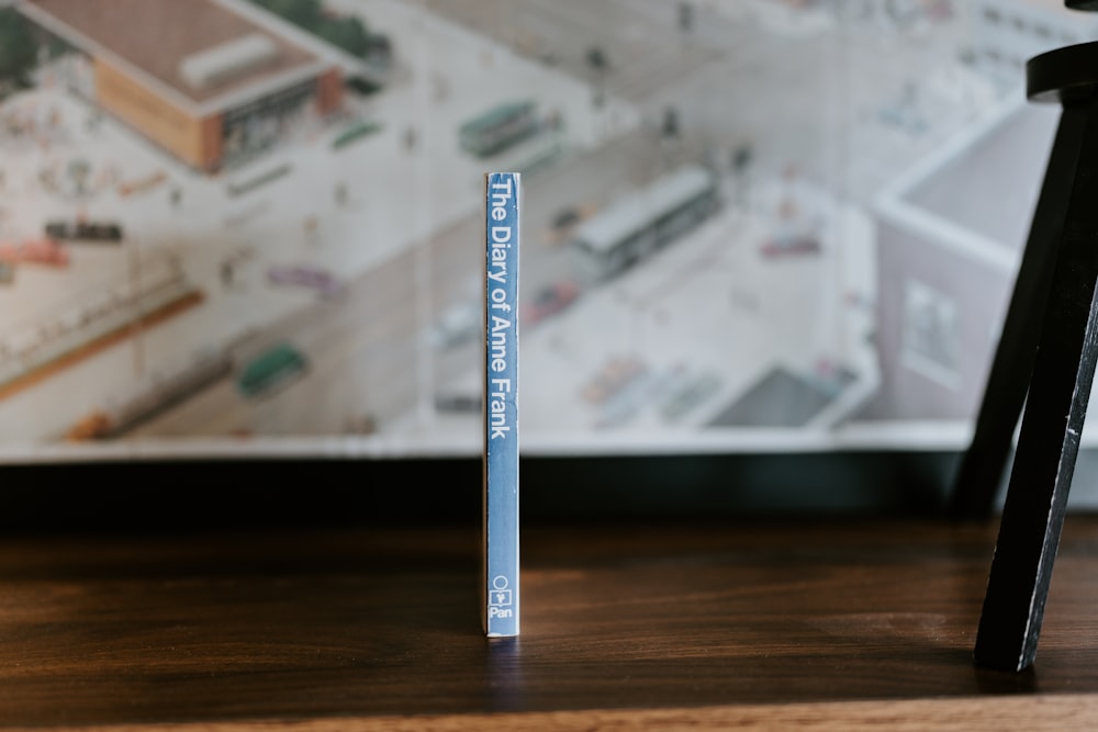 a close up of a tube of toothpaste on a table