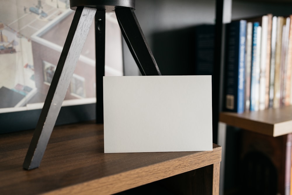 a picture frame sitting on top of a wooden table