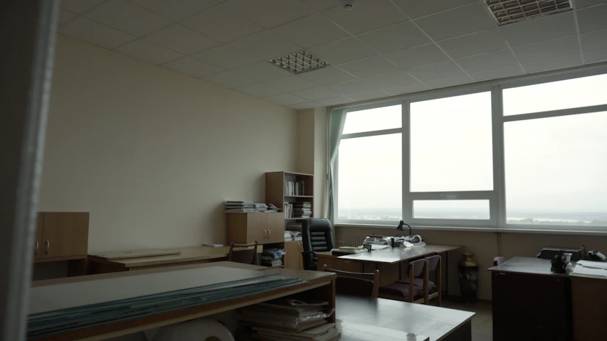 A serene office setting with real estate notes and business paperwork neatly arranged.