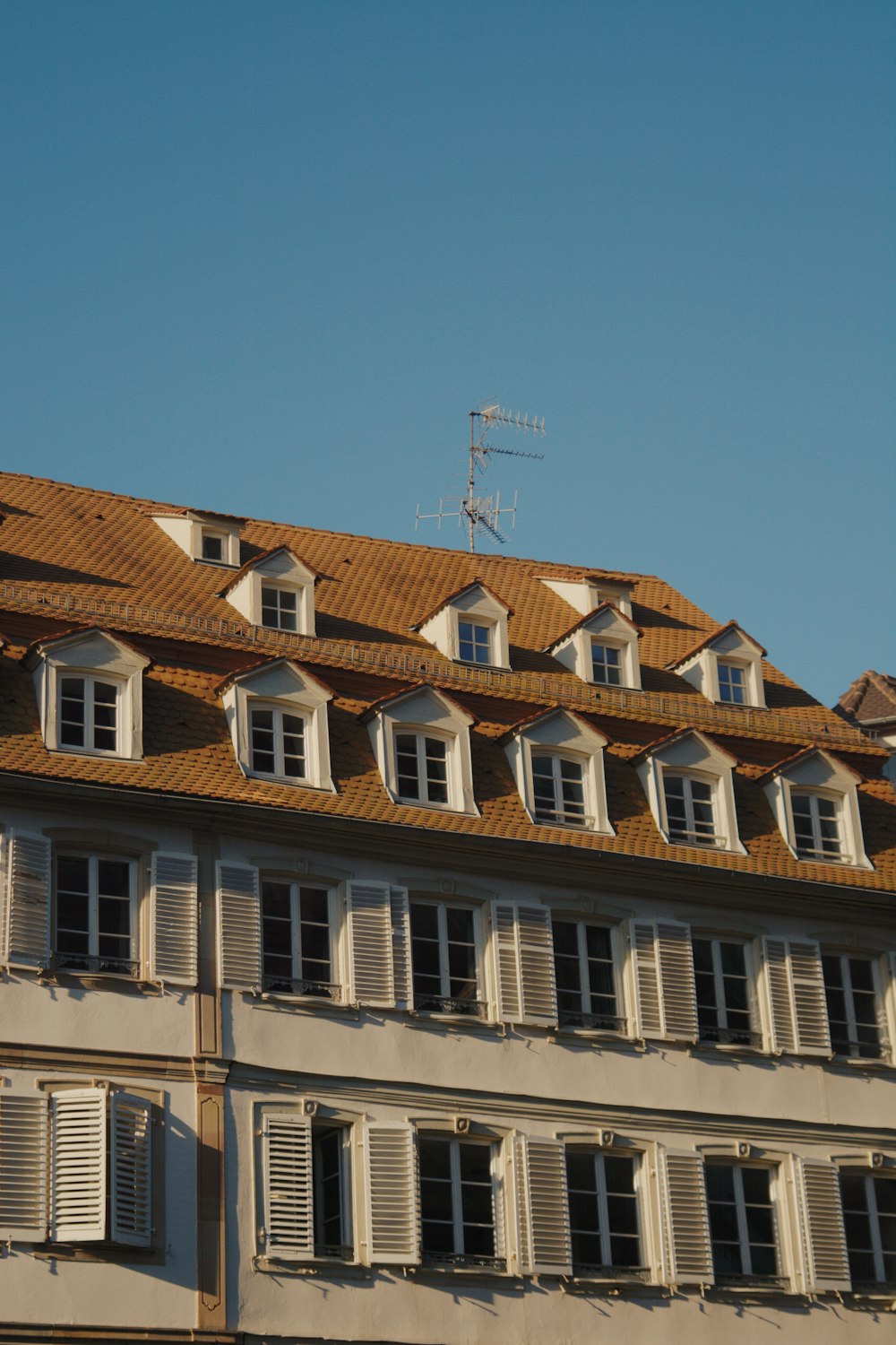 a building with a clock on the front of it