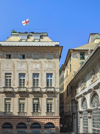 a large building with a flag on top of it
