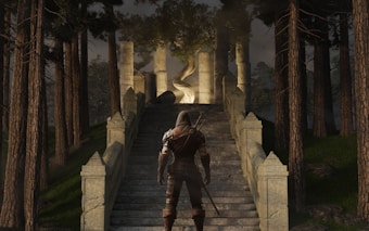 A hooded figure dressed in medieval or fantasy-inspired armor stands at the bottom of a large stone staircase in the middle of a dense forest. The staircase leads up to a large tree illuminated by light, surrounded by ancient stone pillars. The surrounding trees are tall and densely packed, creating a dark and mystical atmosphere.