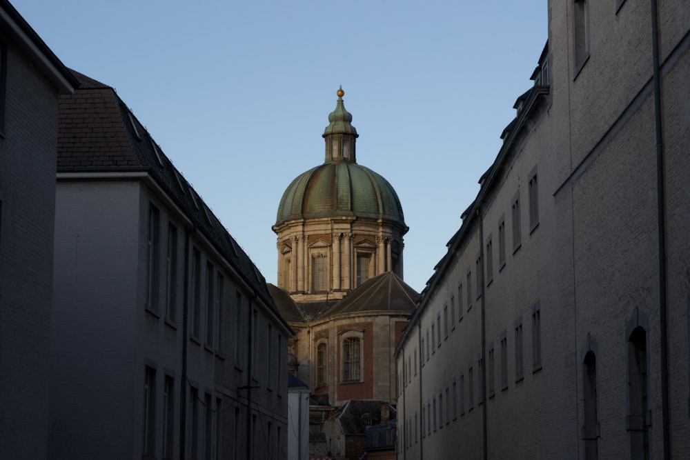 a tall building with a dome on top of it