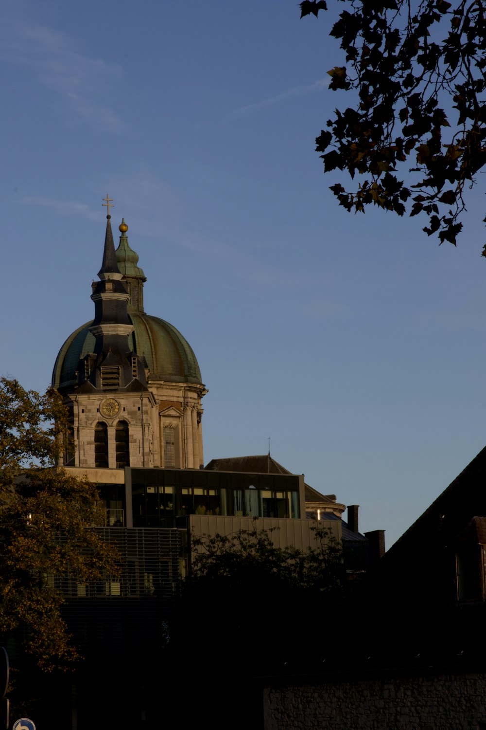 a building with a dome and a clock on it