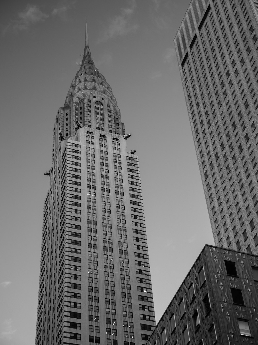 a black and white photo of a tall building