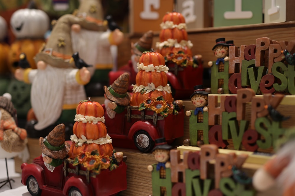 a display of pumpkins and other holiday decorations