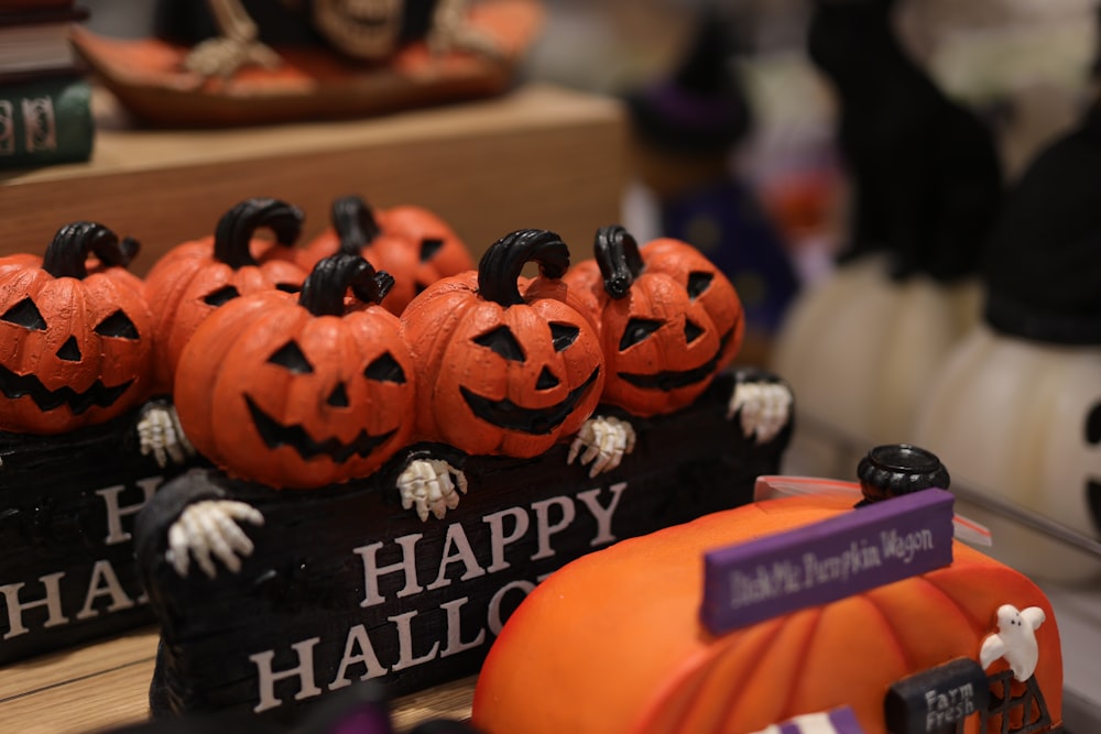 a group of pumpkins sitting on top of a table