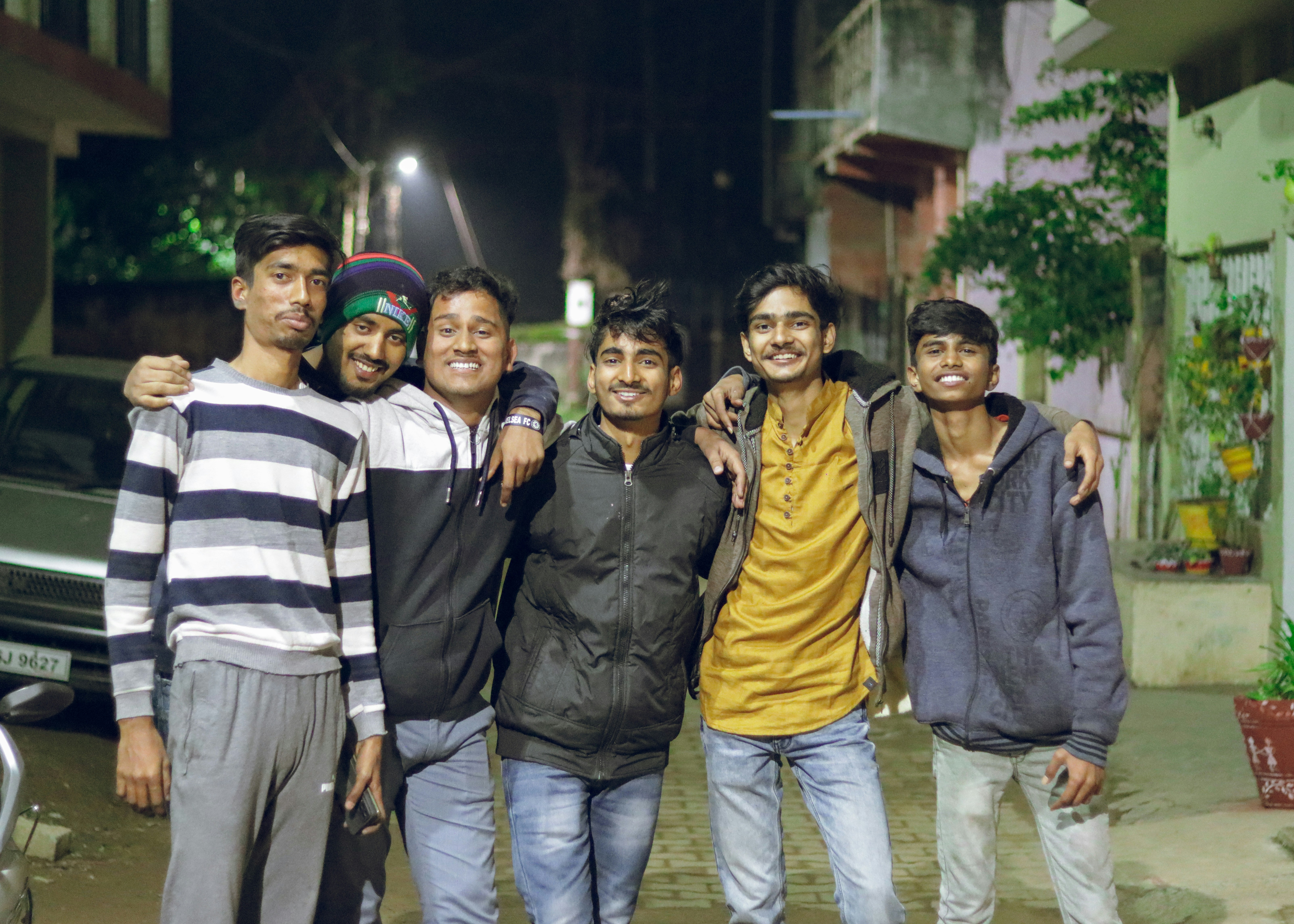 Group of men standing in a row