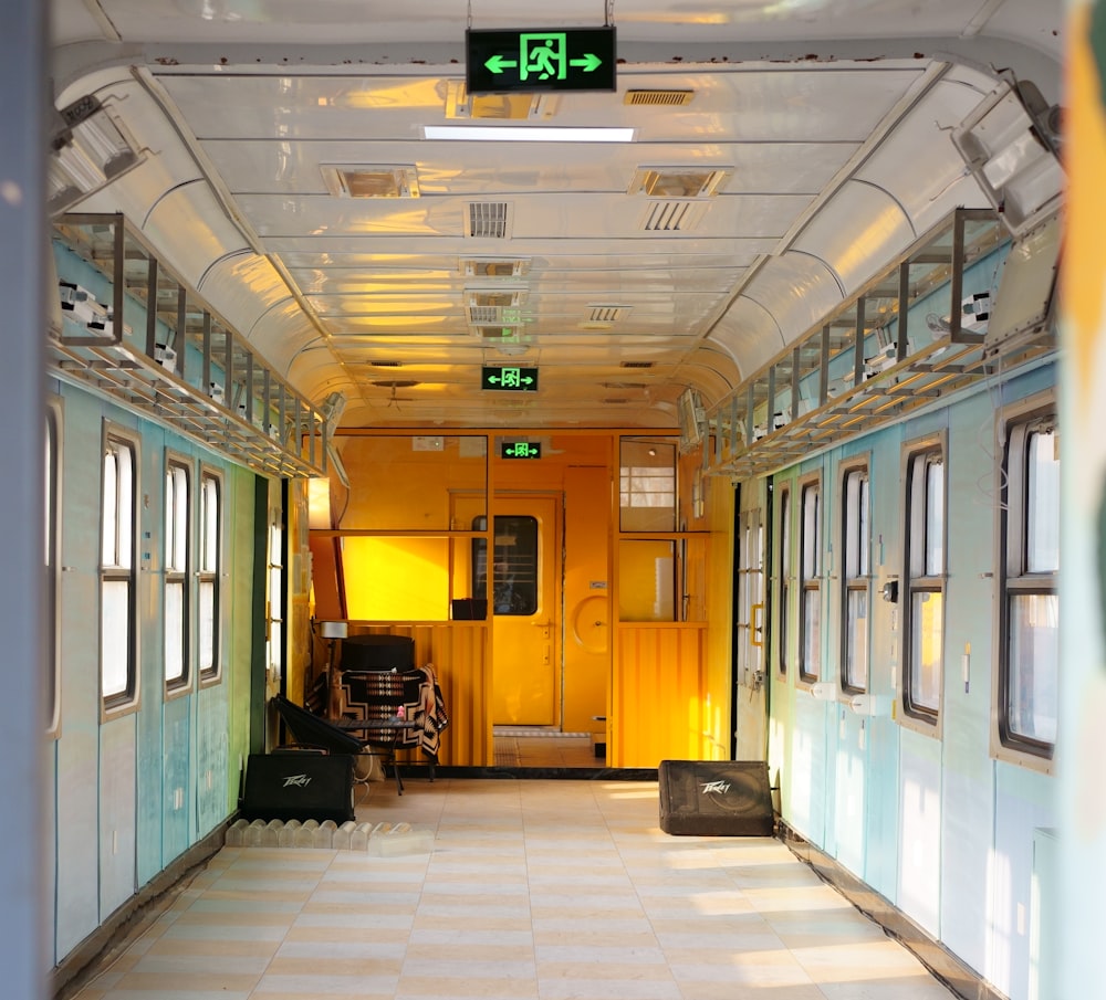 a train car with a green sign on the door
