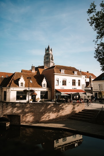 A cozy café terrace in a charming European town during golden hour