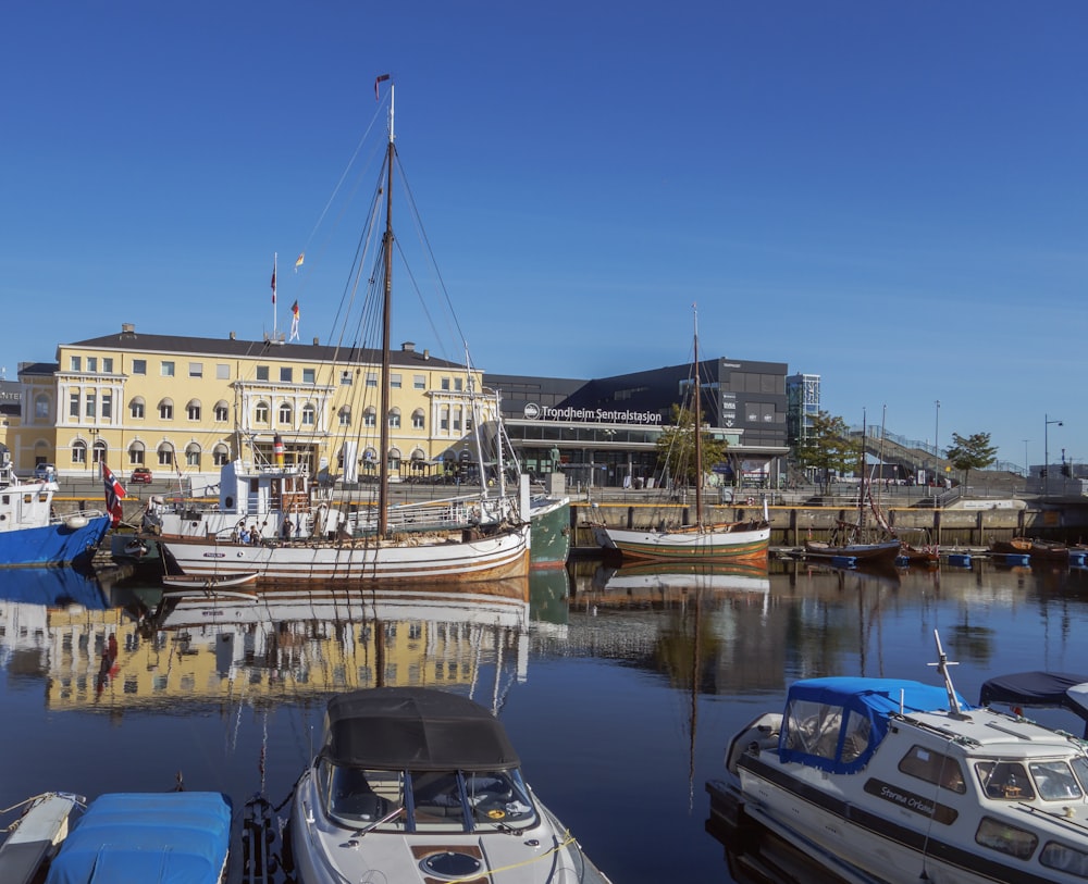 a group of boats that are sitting in the water