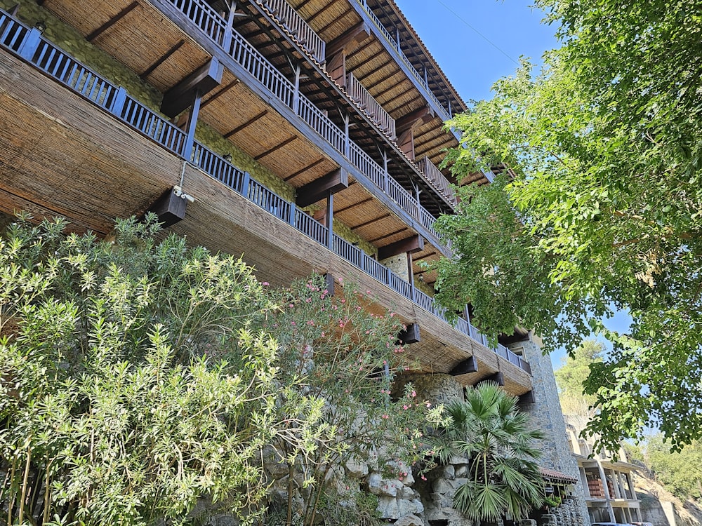 a tall building with balconies and balconies on top of it