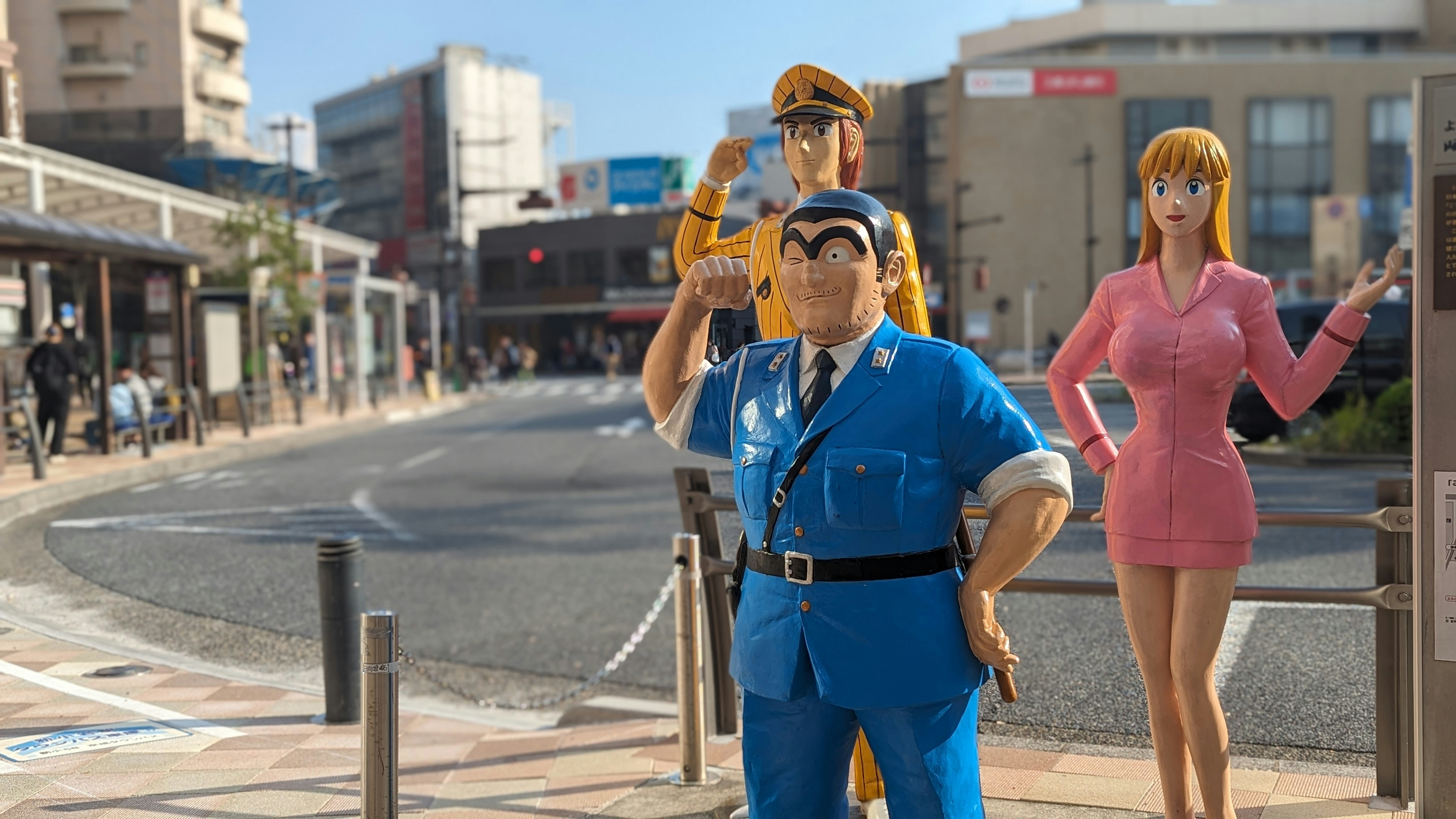 a group of people standing next to each other on a street