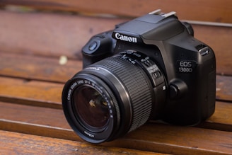 a camera sitting on top of a wooden bench